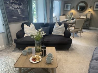 Loung Area with 2 seater sofas and a formal dining area