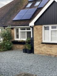 The front! Off street parking and Solar Panels Environmentally Friendly.