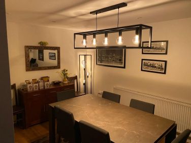 Caligari Dining room table seats 6 with dimmer lighting