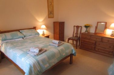 Family room with double bed, single bed plus pullout bed.  Sea View