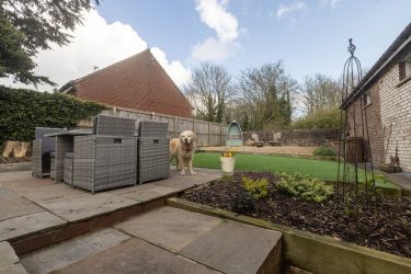 The enclosed garden with seating areas, and a BBQ for sunny days