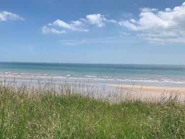 The cottage is just yards from the steps to the stunning sandy North  beach