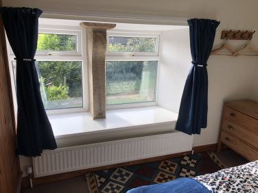 Bedroom 3 - A good sized single, with a wide window overlooking the garden to fells beyond