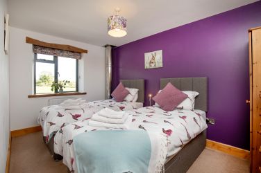 Twin/superking room. With views over open famland.