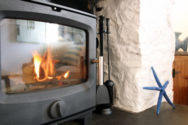 Brand New log burner to keep you cosy after those fresh days exploring the gower coastline