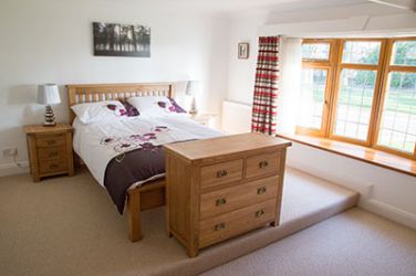 The bay window in the double bedroom delivers lots of light and has plenty of storage as well.