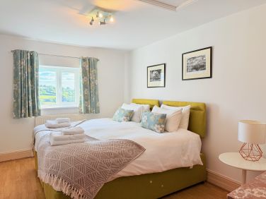 Comfortable double bedroom for a restful countryside stay