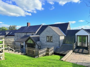 Traditional stone cottages with shared gardens and outdoor space