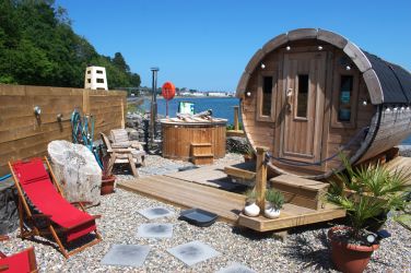 Just a few minutes walk away you can book Beaumaris beach sauna and hot tub seacoastsaunas.co.uk