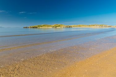 Anglesey is known for its miles of sandy beaches like this one Traeth Llanddwyn