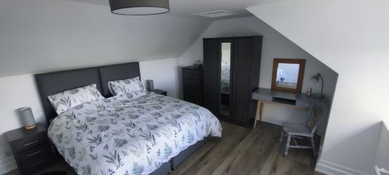 Bedroom with beds in super king configuration