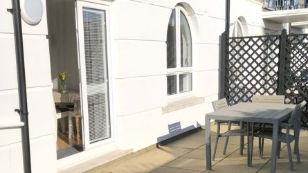 Patio with table and chairs. No traffic noise