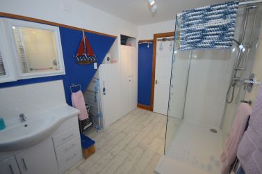 Spacious shower rooom with walk in shower