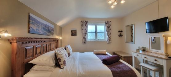 View of the bedroom with views to Dartmoor. Watch the sun rise over Dartmoor if you're up early