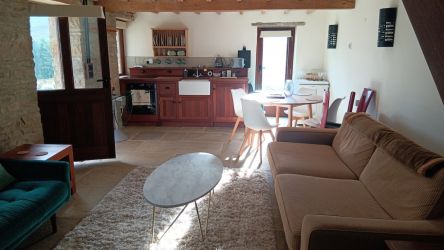 Kitchen and Dining/TV Area