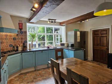 Lovely spacious well equipped kitchen with loads of storage and large fridge freezers