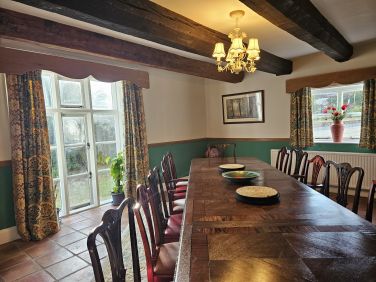 Plenty of room to seat everyone round the vintage restored statement dining table