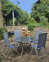 There are numerous seating options throughout the garden, plus BBQ and fire pit