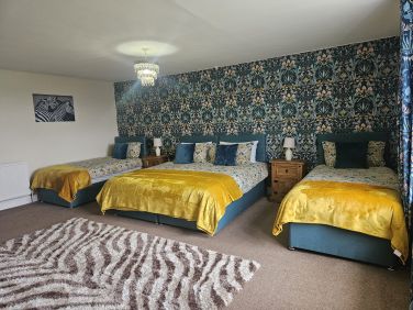 The option of 1 x super king and 2 singles OR 4 x singles in 'Dreamweaver' bedroom