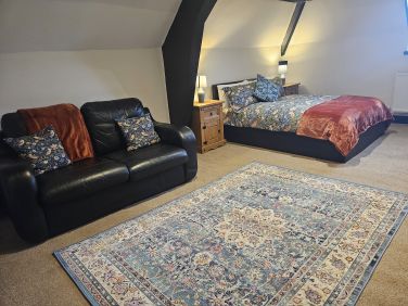 'Hibernation Hub' on the top floor has wonderful statement beams and a comfy double bed
