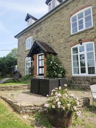 Beautiful views from the house across the gardens and meadows