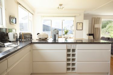 Kitchen looking towards dining area, conservatory and loch