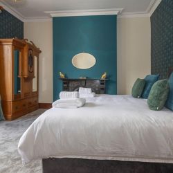 Art Deco room super king beds convertible to twin bed. Mountain views