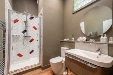 Bedroom 4. Separate shower room with natural light.