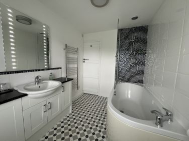 Shower over bath