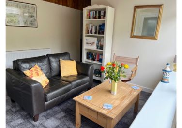 Garden room with access to extensive garden & patio. Board games & books.