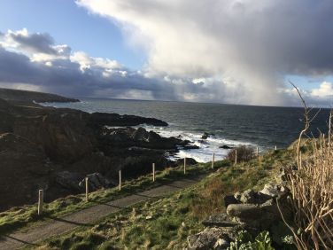 Start of the coastal path to Sandend, just over the garden wall