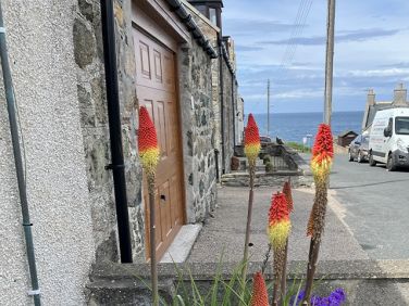 Street view looking down to the sea.  Few minutes walk down to the old harbour