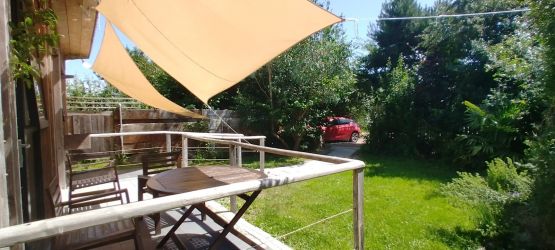 South Facing Patio & Private garden with parking beyond