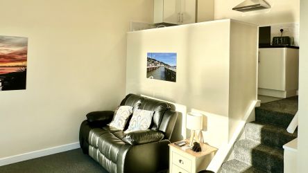 Curlew - Aberdovey Hillside Village - View toward kitchen from dining