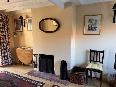 Spacious Living/Dining Room with Open Fire