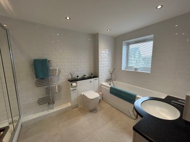 En-suite bath and shower room Bedroom 2