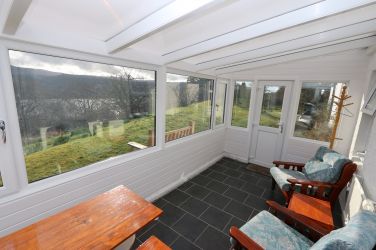 Sunroom - ideal for sitting and watching wildlife that comes into the garden, deer squirrels etc
