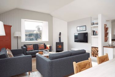 A bright and sunny room looking over the garden