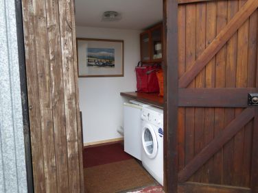Laundry room with parasol