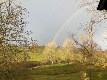 Rainbow over the Afon Dulas that runs through the farm