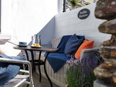 Upper south facing patio with sea views.