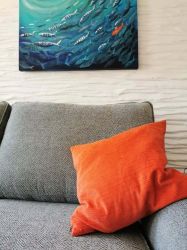 Blues with an accent of Orange used throughout.