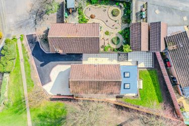 Aerial shot showing a main entrance to the property