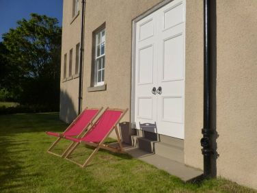 Side of building (good spot for sunbathing)