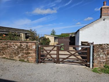 Enclosed Rear Yard with lockable shed and tap and hosepipe to wash equipment or dogs