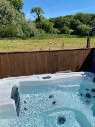Hot tub overlooking fields
