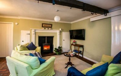 The Snug - comfy room with TV and Log Burner - ideal chill out room