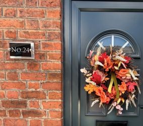 Our welcoming front door! We change our door wreaths with the seasons!