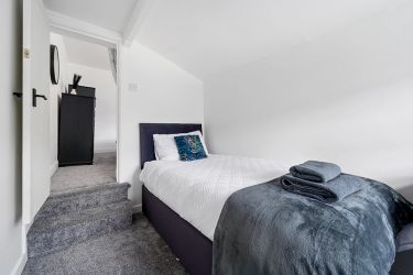 The Single Room (please note that the entrance is off of the Main Room)