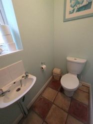 Downstairs cloakroom, next to bedroom